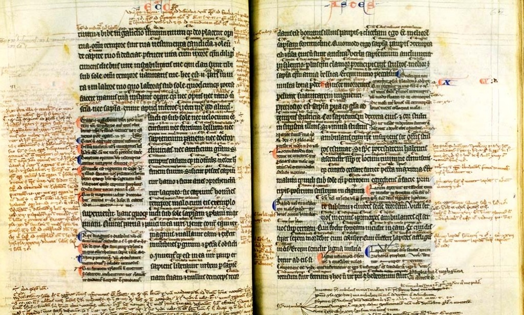 A medieval hand-copied Bible with the "Ordinary Gloss" and a rich harvest of personal annotations from a scholar of long ago.